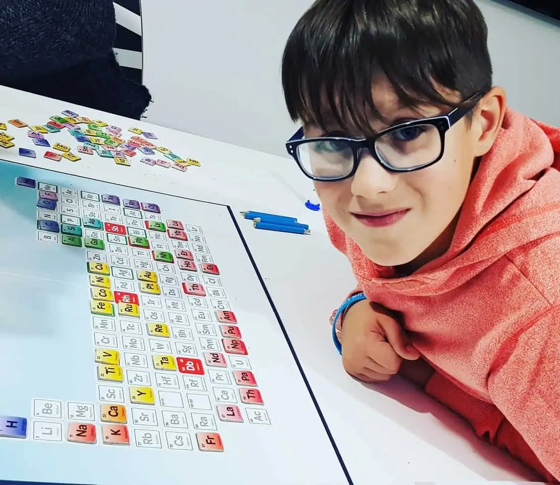 Boy playing Frenetic board game