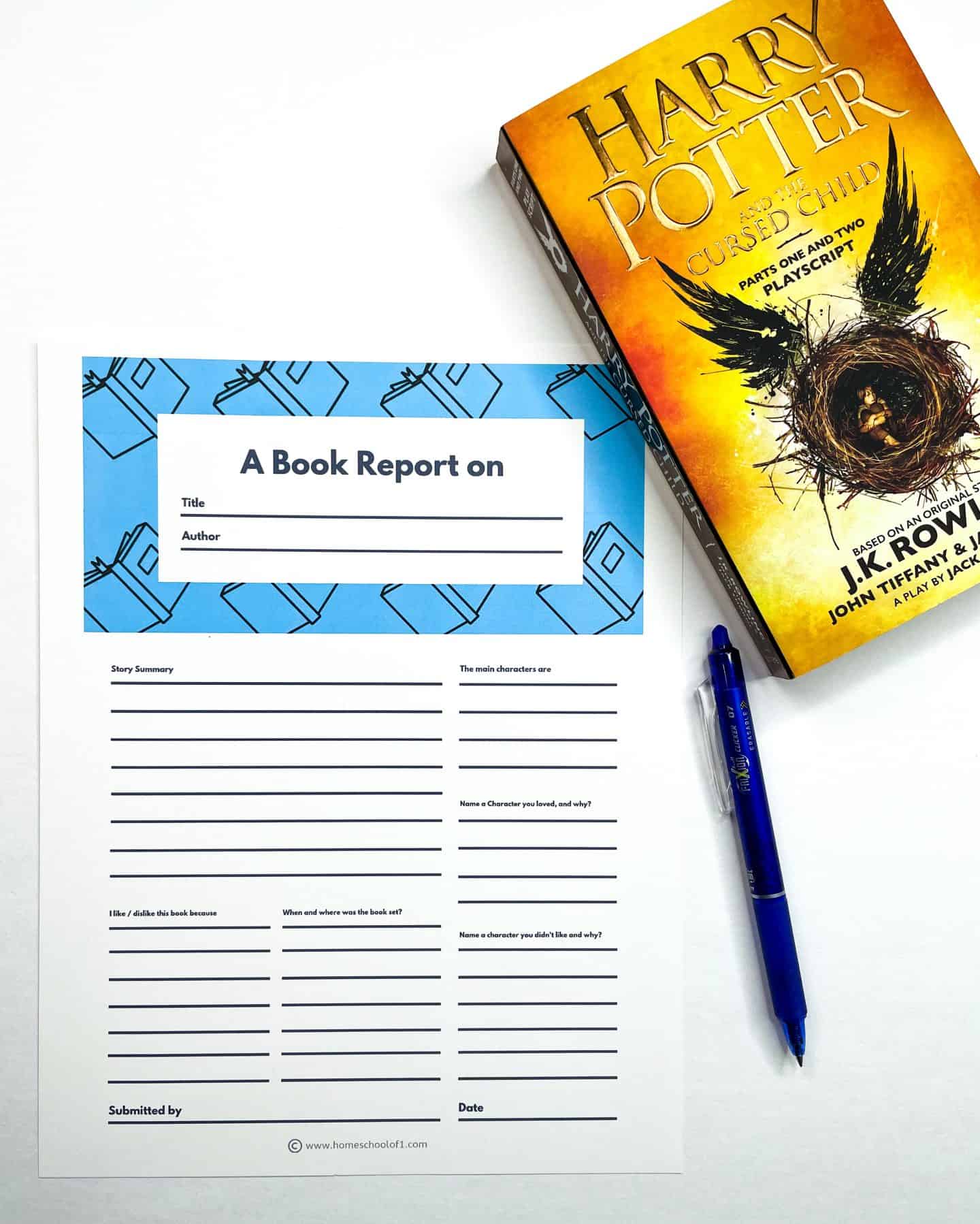 A single blue-topped book report worksheet titled "A Book Report on" lies next to a copy of Harry Potter and the Cursed Child and a blue pen. The worksheet includes spaces for the book’s title, author, summary, characters, and personal reflections.