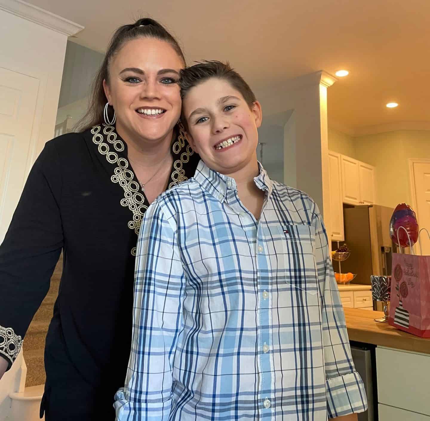 Mom and son smiling