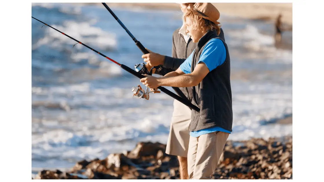 tween boy fishing with his dad