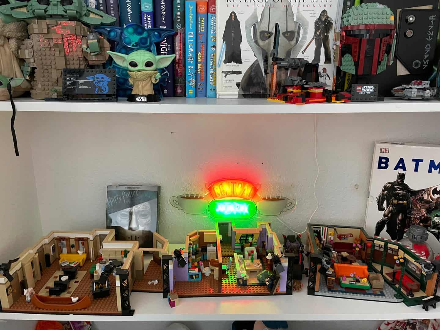 boys bedroom shelves showing books and lots of lego builds