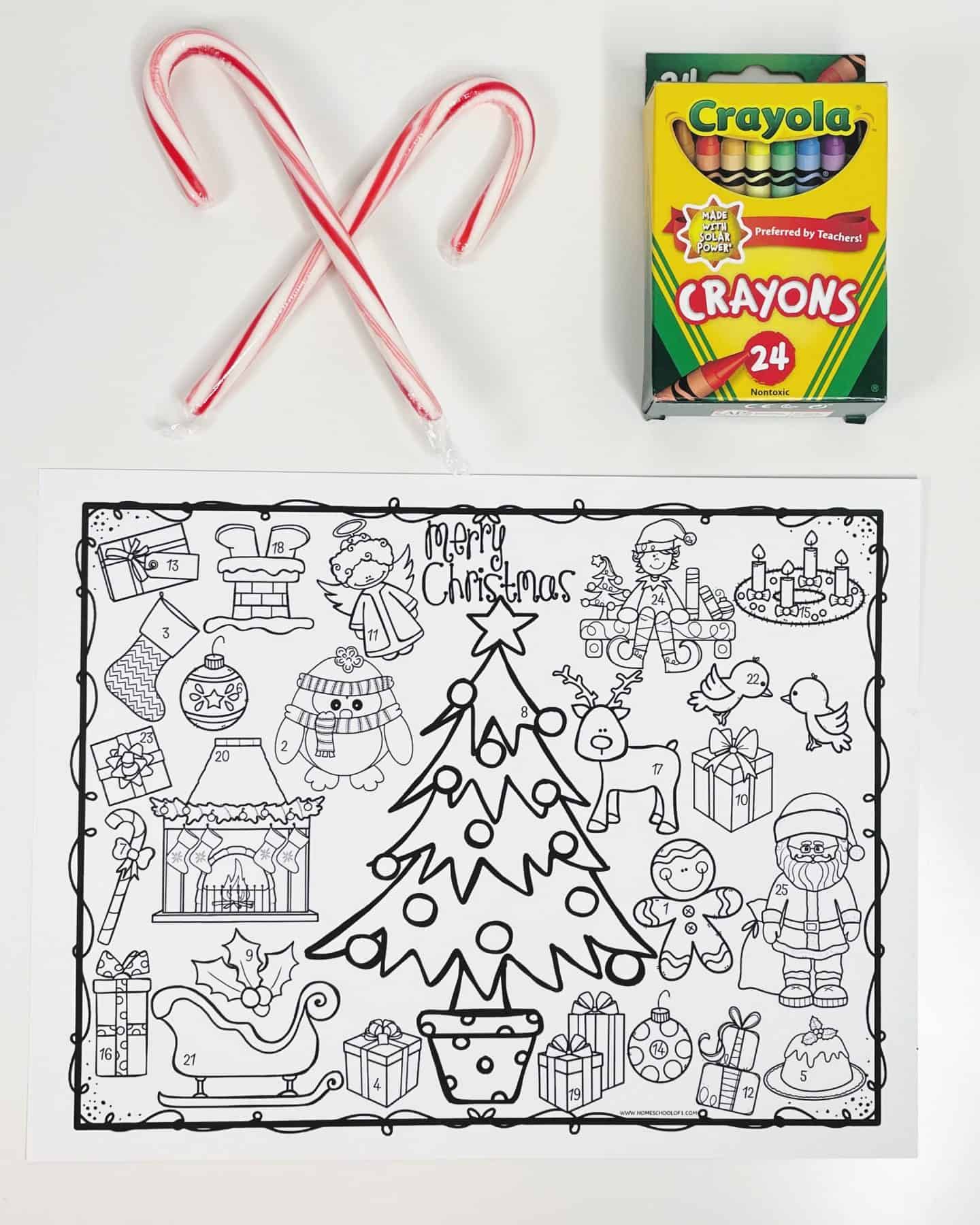 A black and white Christmas coloring advent calendar featuring a central Christmas tree surrounded by 25 numbered festive illustrations, including Santa, a fireplace, gifts, ornaments, and holiday treats. Above the coloring sheet are two candy canes crossed in an “X” and a 24-pack box of Crayola crayons, ready for decorating.