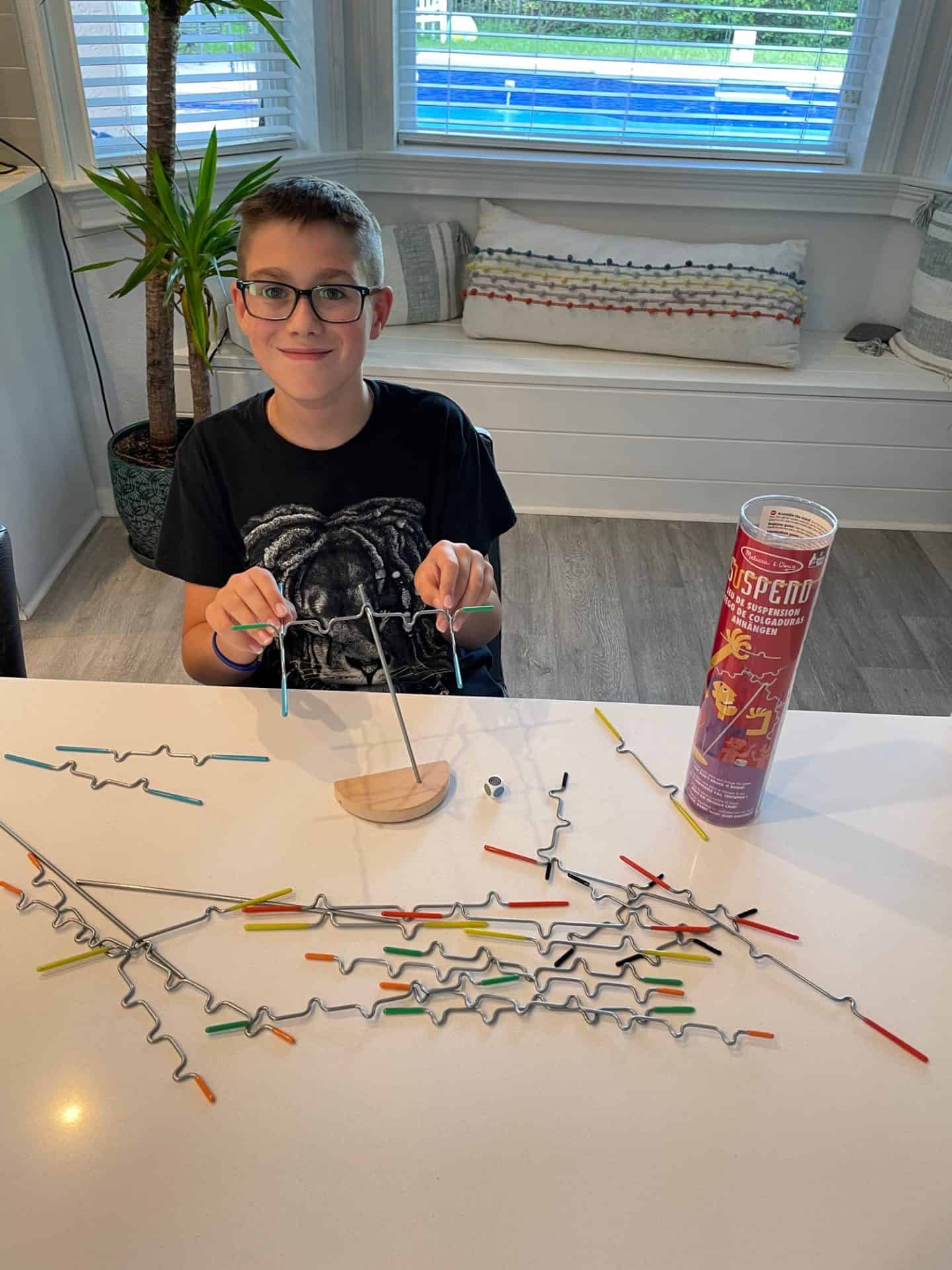 Boy playing suspend