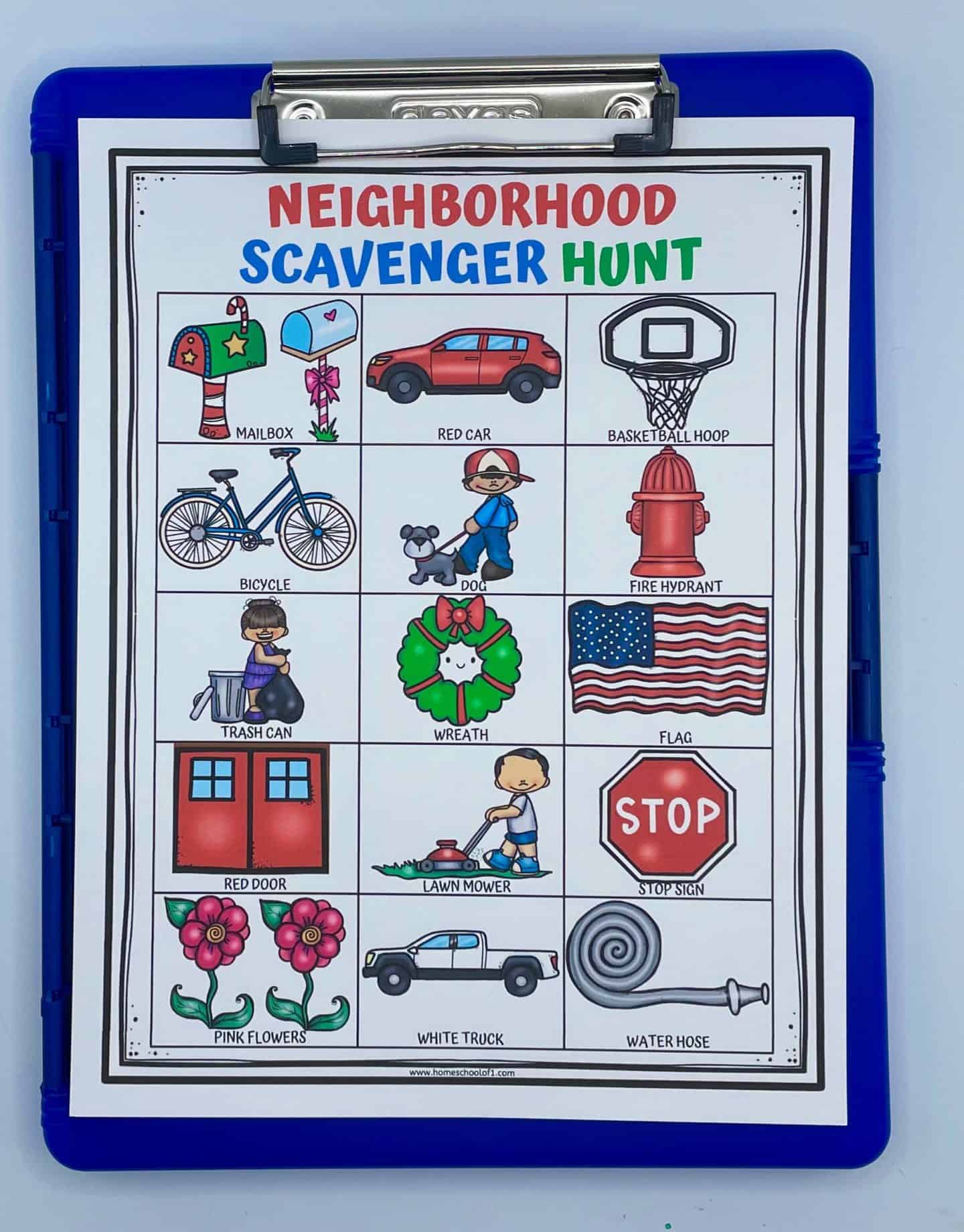 Printable neighborhood scavenger hunt worksheet attached to a blue clipboard. The activity sheet includes colorful illustrations and labels for items to find outdoors, such as a mailbox, red car, bicycle, dog, fire hydrant, flag, lawn mower, stop sign, and water hose.