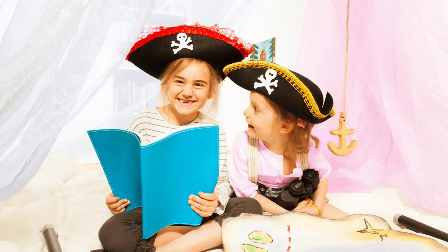Kids reading pirate books