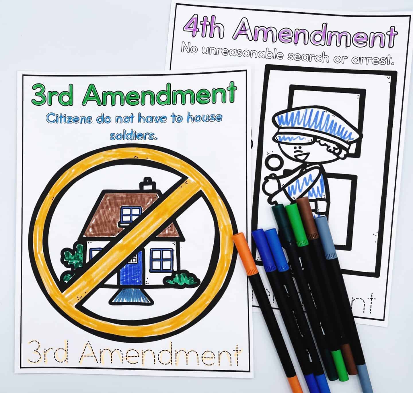 Two printable coloring pages for teaching the 3rd and 4th Amendments of the U.S. Bill of Rights. The 3rd Amendment page shows a house with a bold “no” symbol over it and the text “Citizens do not have to house soldiers,” while the 4th features a cartoon police officer at a door with the caption “No unreasonable search or arrest.” Several colorful markers lie on top, partially used for coloring.

