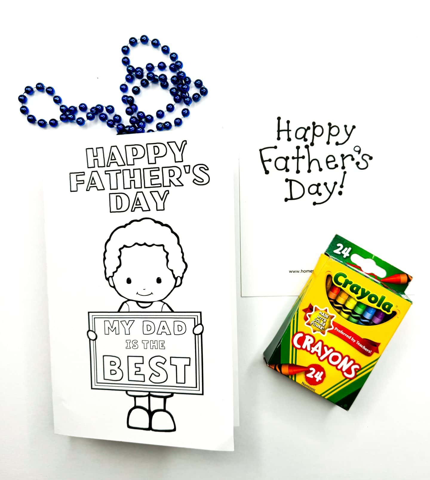 Printable Father's Day card to color featuring a smiling child holding a sign that says "My Dad is the Best" under the words "Happy Father's Day." The image includes a blue bead necklace, a 24-pack of Crayola crayons, and an additional minimal card design that reads "Happy Father’s Day!" in a playful font.