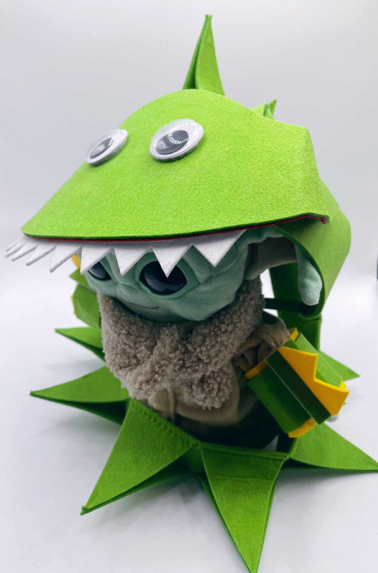 baby yoda plush wearing dragon head