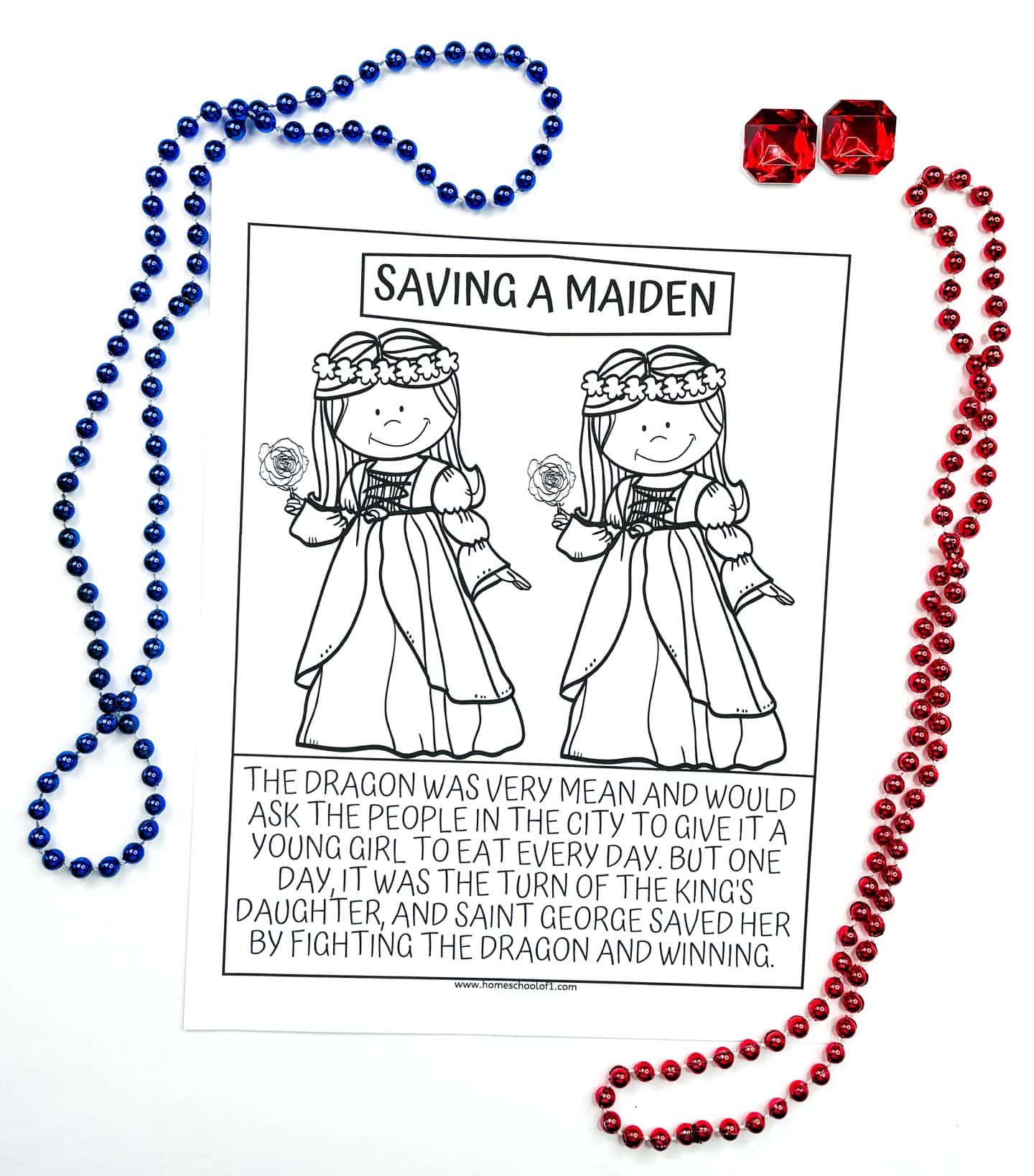A black-and-white children's coloring page titled "Saving a Maiden," showing two identical cartoon princesses in gowns with flower crowns, each holding a rose. The caption below explains that a dragon demanded daily sacrifices of young girls from a city, and when it was the king’s daughter’s turn, Saint George saved her by defeating the dragon. The page is surrounded by blue and red beaded necklaces and two red faux gems.

