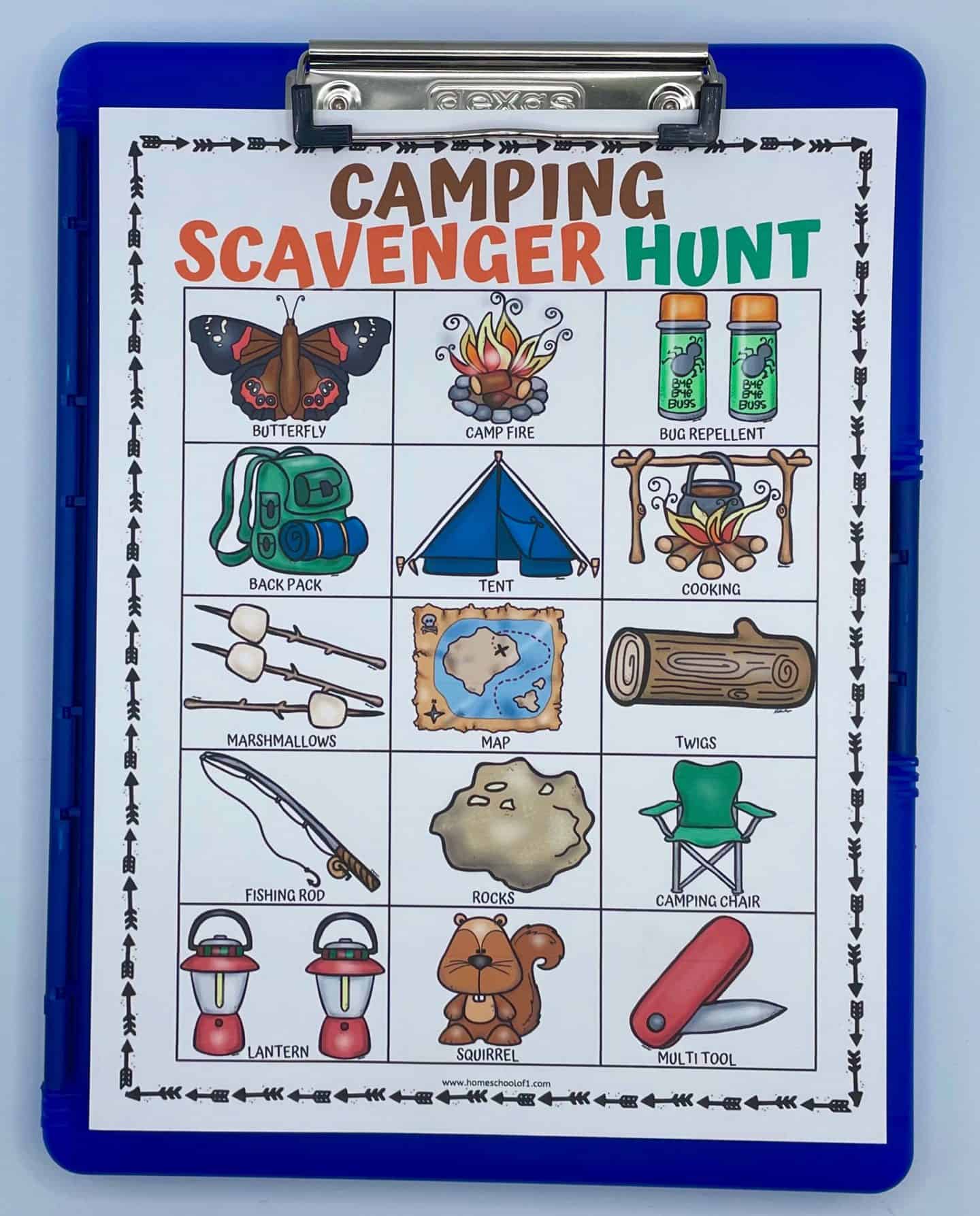 camping scavenger hunt printable on a blue clipboard