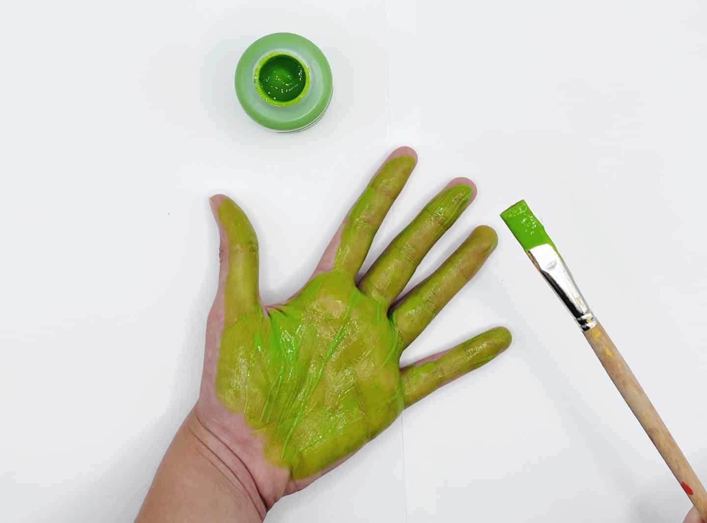 green handprint