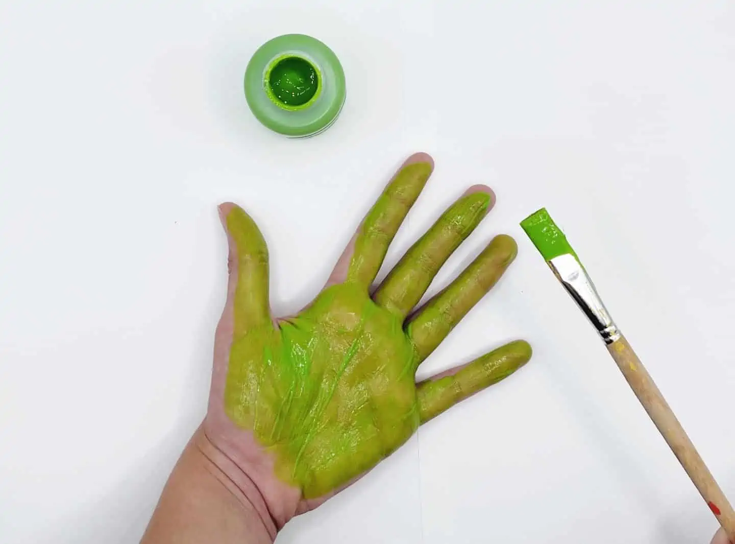 green handprint