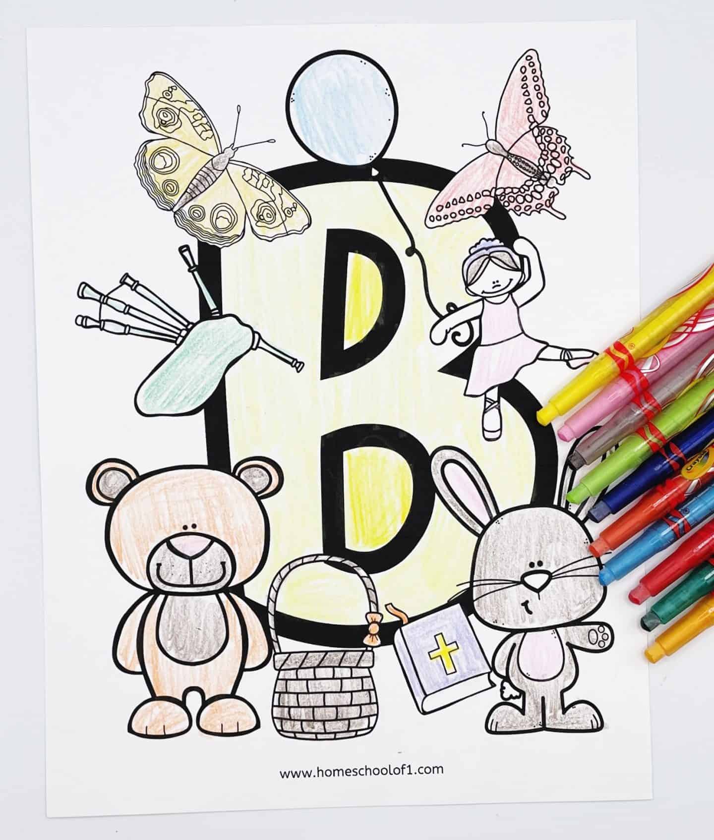 letter b coloring page featuring an uppercase B and surrounding it is a butterfly, a balloon, a bear, a bible, a basket and crayola twistables that have been used to color it in.