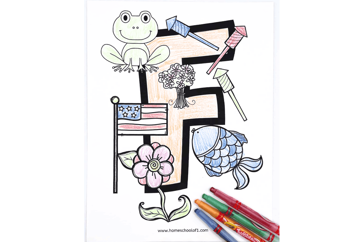 Letter F coloring page featuring a large uppercase F with illustrations of a frog, fish, flower, flag, fireworks, and crayons, partially colored by a child.