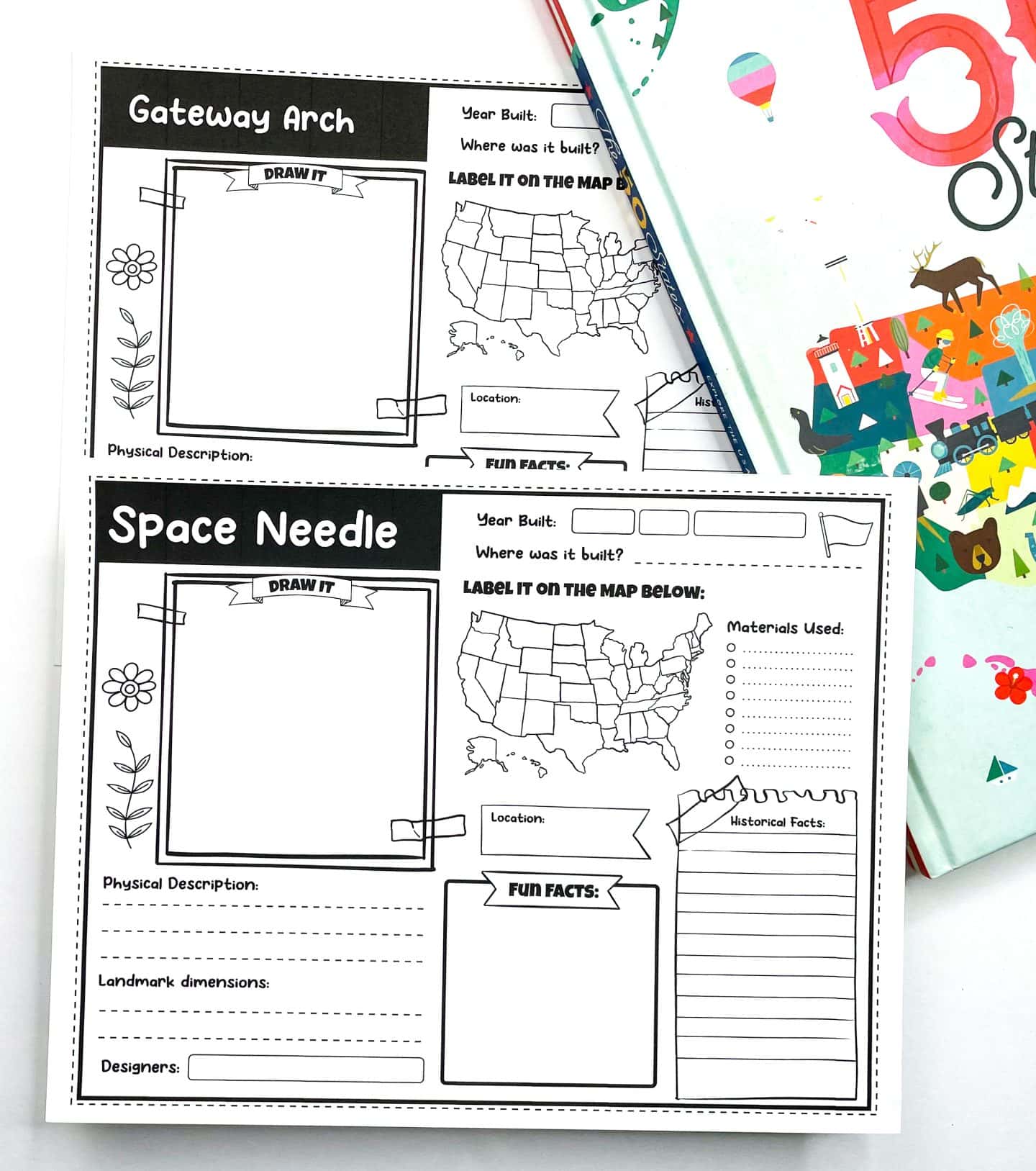 Two printable educational worksheets for kids featuring U.S. landmarks: the Gateway Arch and the Space Needle. Each worksheet includes a blank space for drawing, a U.S. map to label the location, and sections to fill in the year built, location, materials used, physical description, landmark dimensions, designers, fun facts, and historical facts. The pages are laid next to a colorful book titled “The 50 States.”