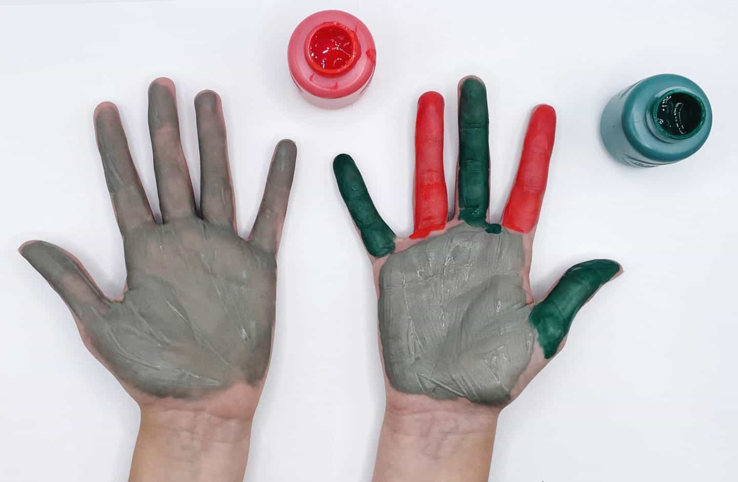 grey handprint with green and red