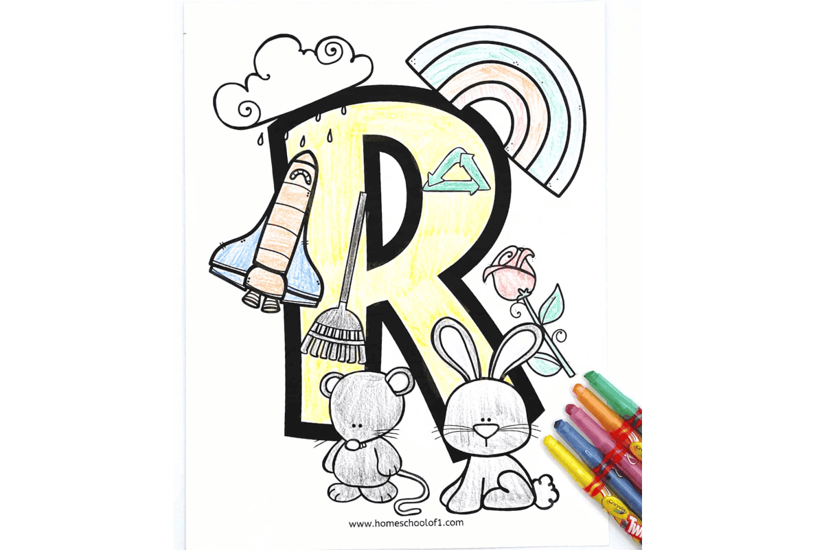 A children's coloring sheet featuring a large, yellow letter "R" surrounded by drawings of objects that start with the letter R, including a rocket, rake, rainbow, rose, rabbit, and a gray mouse. The background is white, and there are colorful crayons placed on the lower right corner of the page.