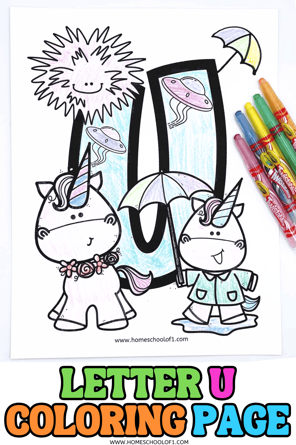 Letter U coloring page featuring unicorns, UFOs, an umbrella, and a sea urchin, colored with crayons.