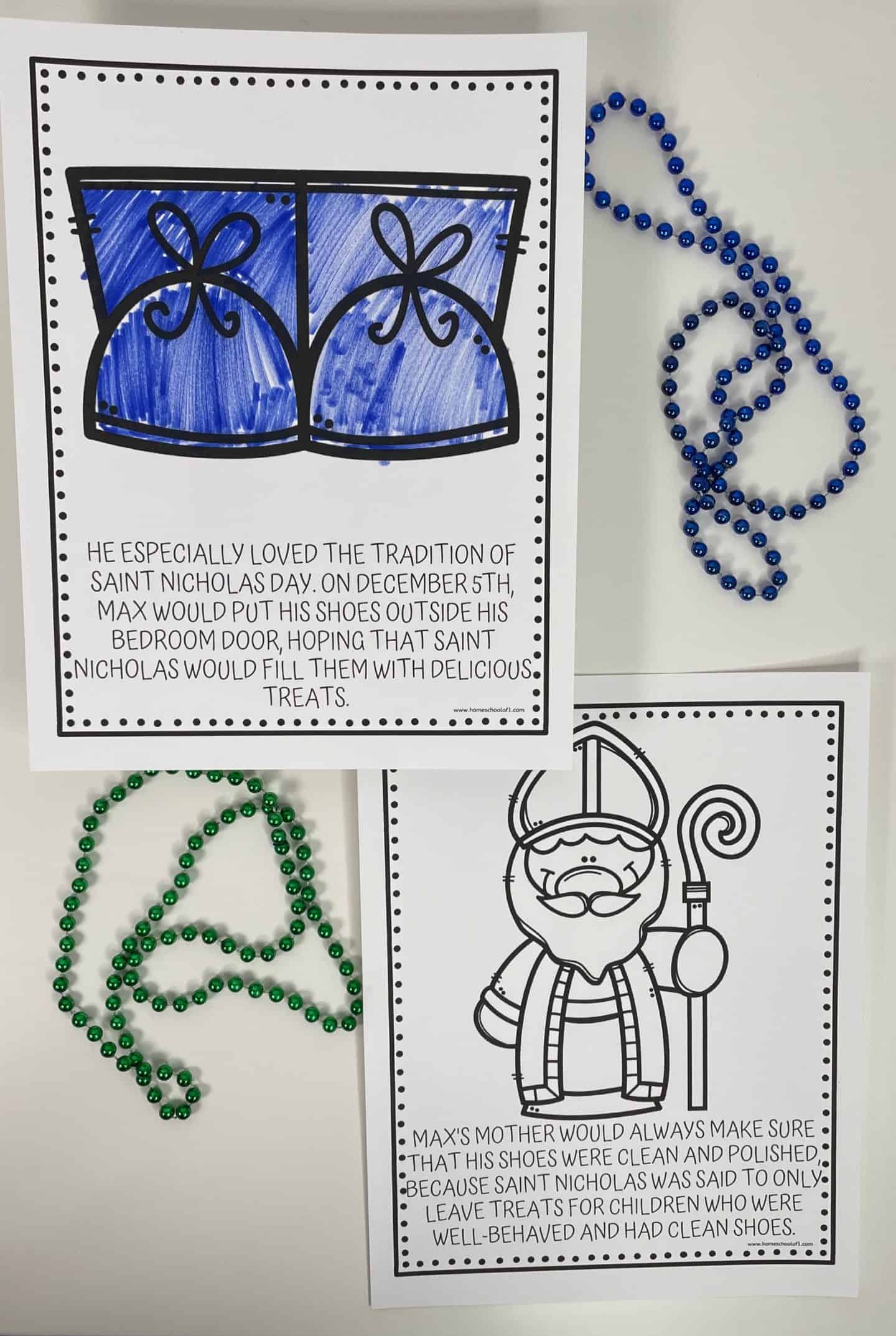 Two Christmas-themed coloring pages depict traditions from Saint Nicholas Day in Germany. The top page shows a pair of blue-colored shoes with a story about Max putting them outside his door on December 5th, hoping Saint Nicholas would fill them with treats. The bottom page features an outlined image of Saint Nicholas with a staff, and text explaining how Max’s mother ensured his shoes were clean since Saint Nicholas only rewarded well-behaved children with tidy shoes. Blue and green beaded garlands are also arranged beside the pages.

