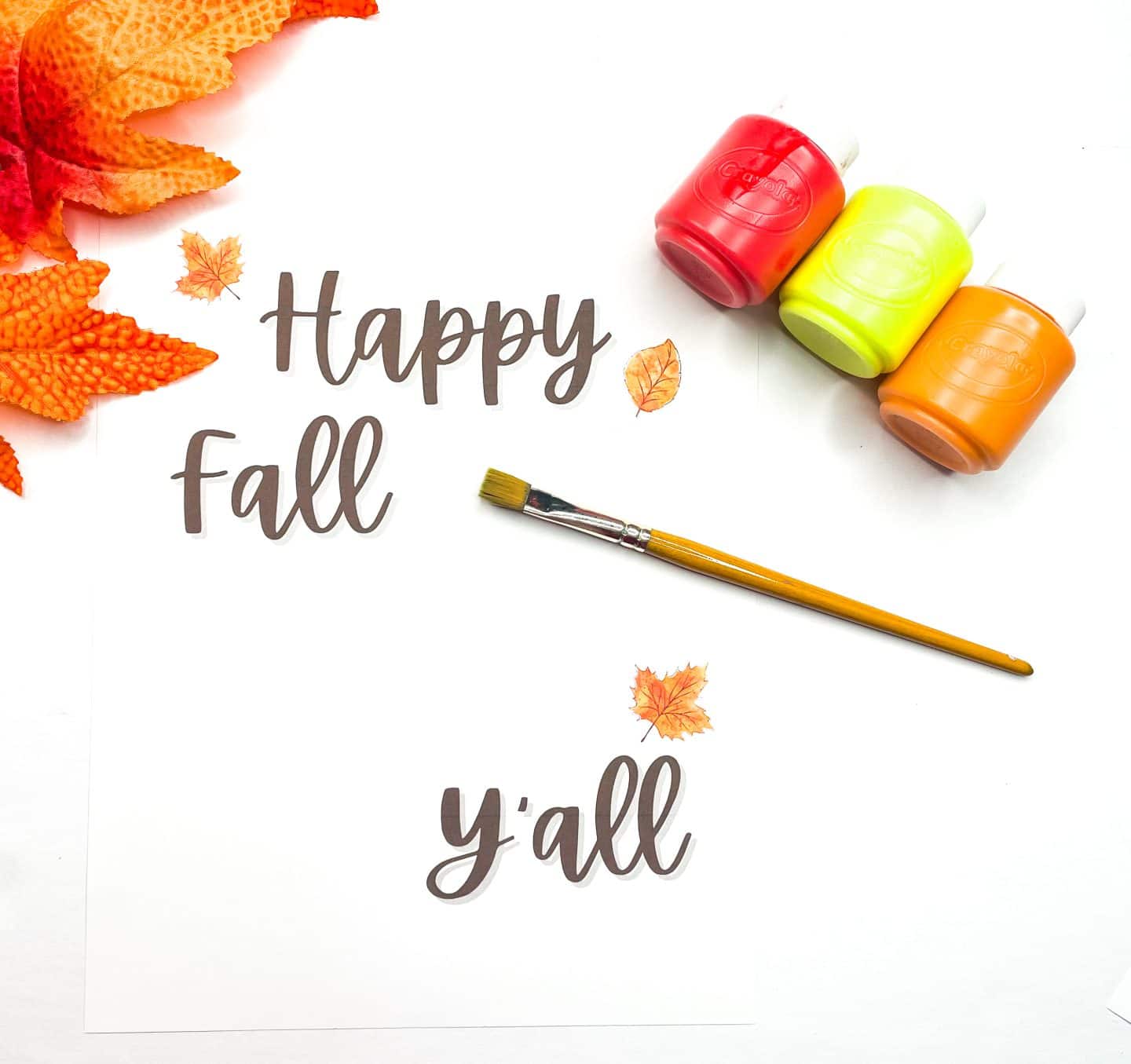 happy fall y'all thanksgiving handprint blank template with red, yellow and orange paint pots and a paint brush.