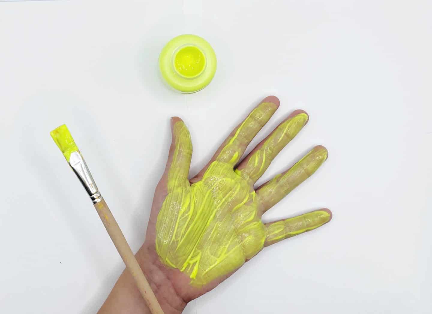 yellow handprint