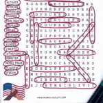 Completed Martin Luther King Jr. word search printable with 16 highlighted vocabulary words such as activist, civil rights, courage, dream, liberty, and Nobel Prize. Illustrated with a drawing of Dr. King and a small American flag graphic.