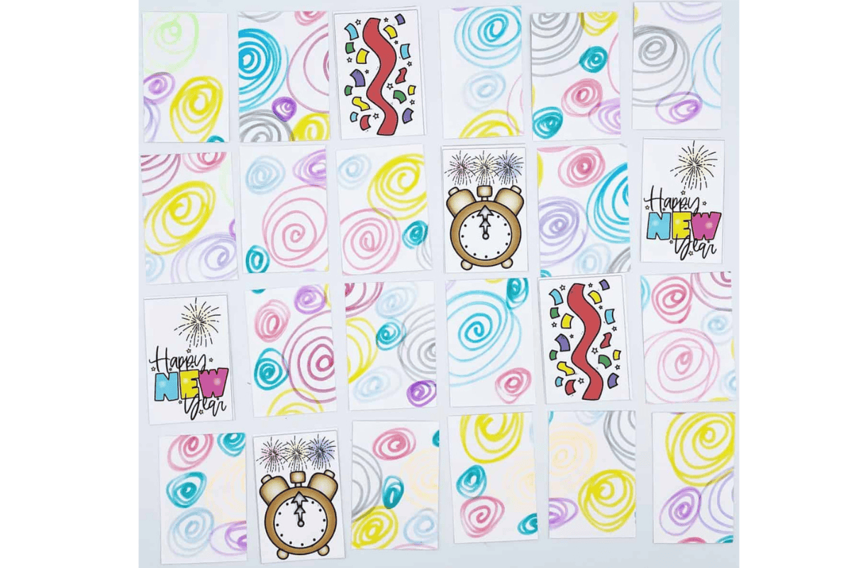 Printable New Year’s Eve memory game cards with festive designs, including clocks, fireworks, confetti, and “Happy New Year” illustrations arranged in rows.