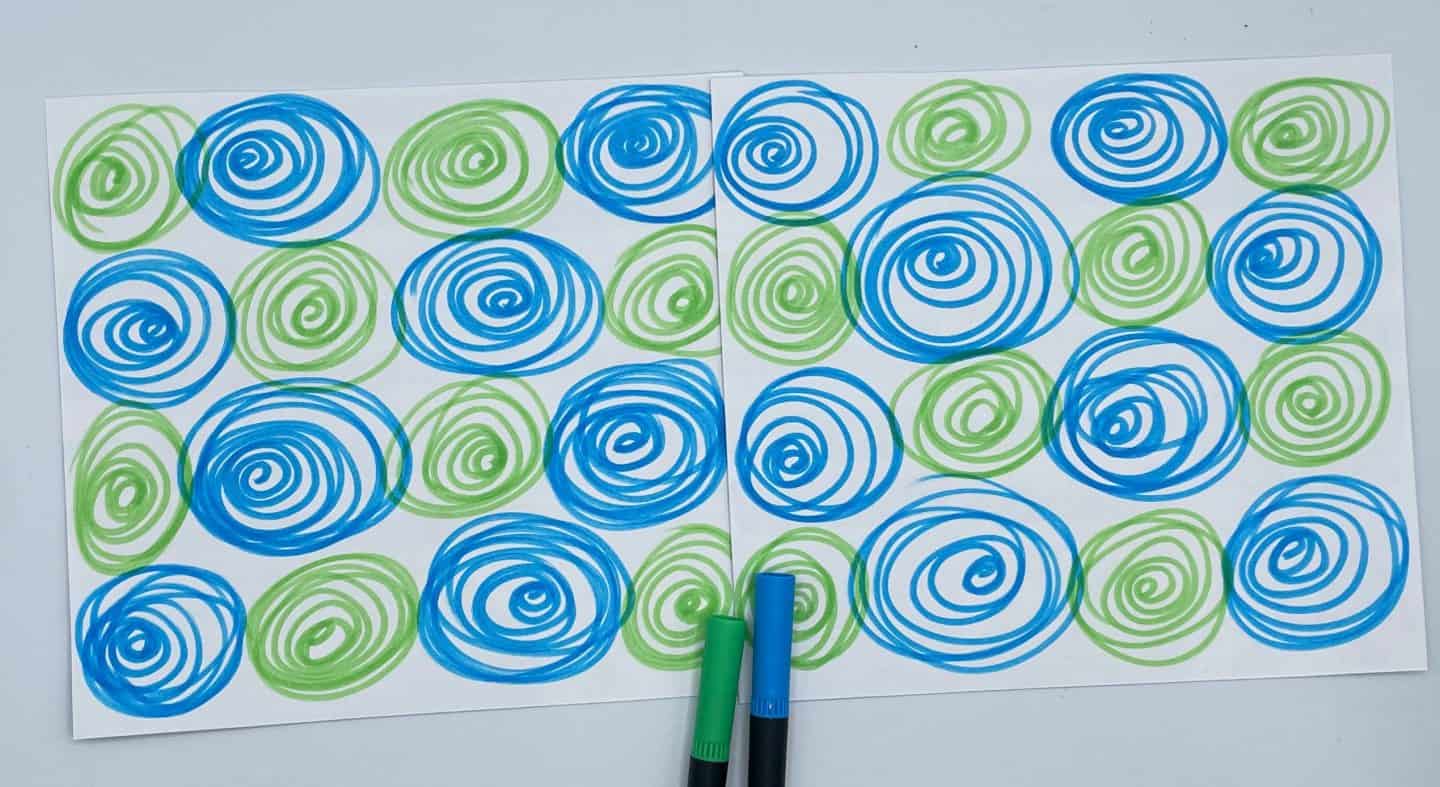 the back of the memory game colored in blue and green swirls.