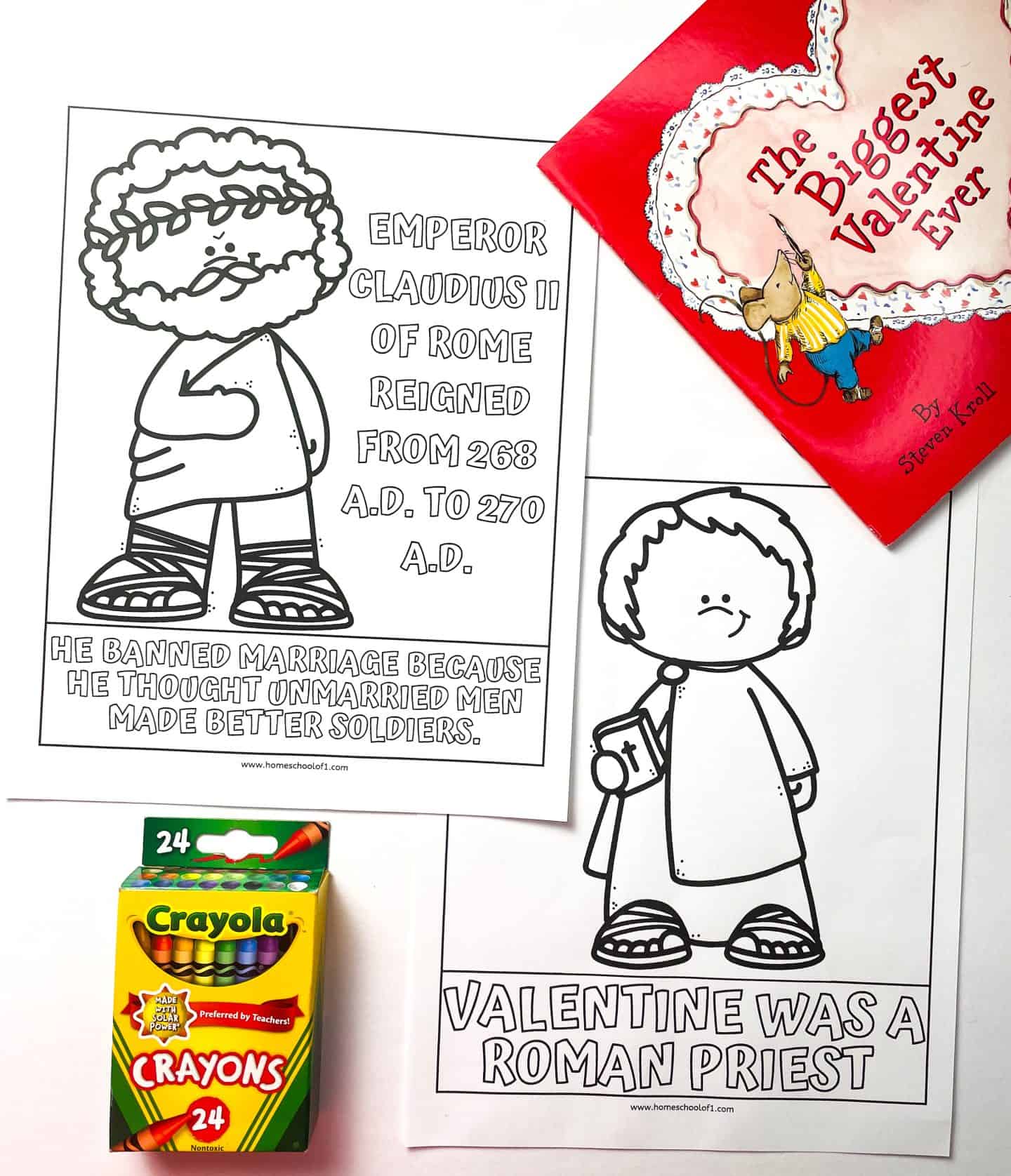 Two Valentine’s Day history coloring pages for kids, one featuring Emperor Claudius II with text about his reign and ban on marriage, and the other depicting Valentine as a Roman priest. The pages are uncolored and accompanied by a 24-pack of Crayola crayons and a red children’s book titled The Biggest Valentine Ever by Steven Kroll.

