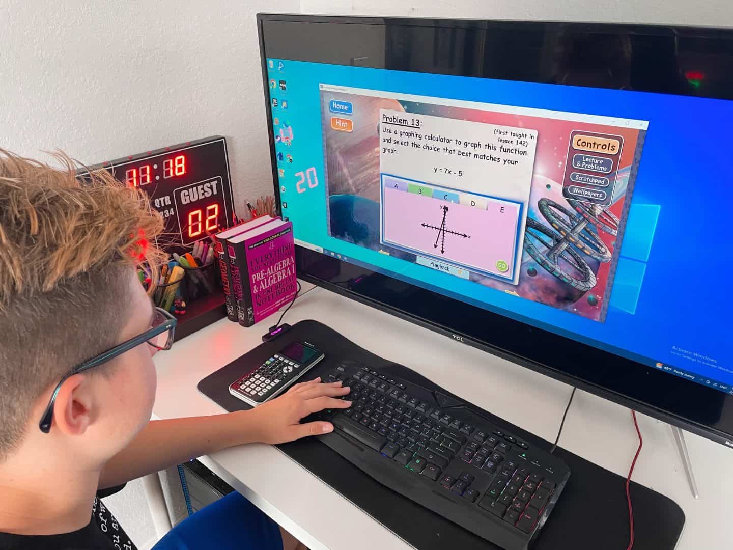  A child using a computer for an online lesson, emphasizing the role of technology in homeschooling.