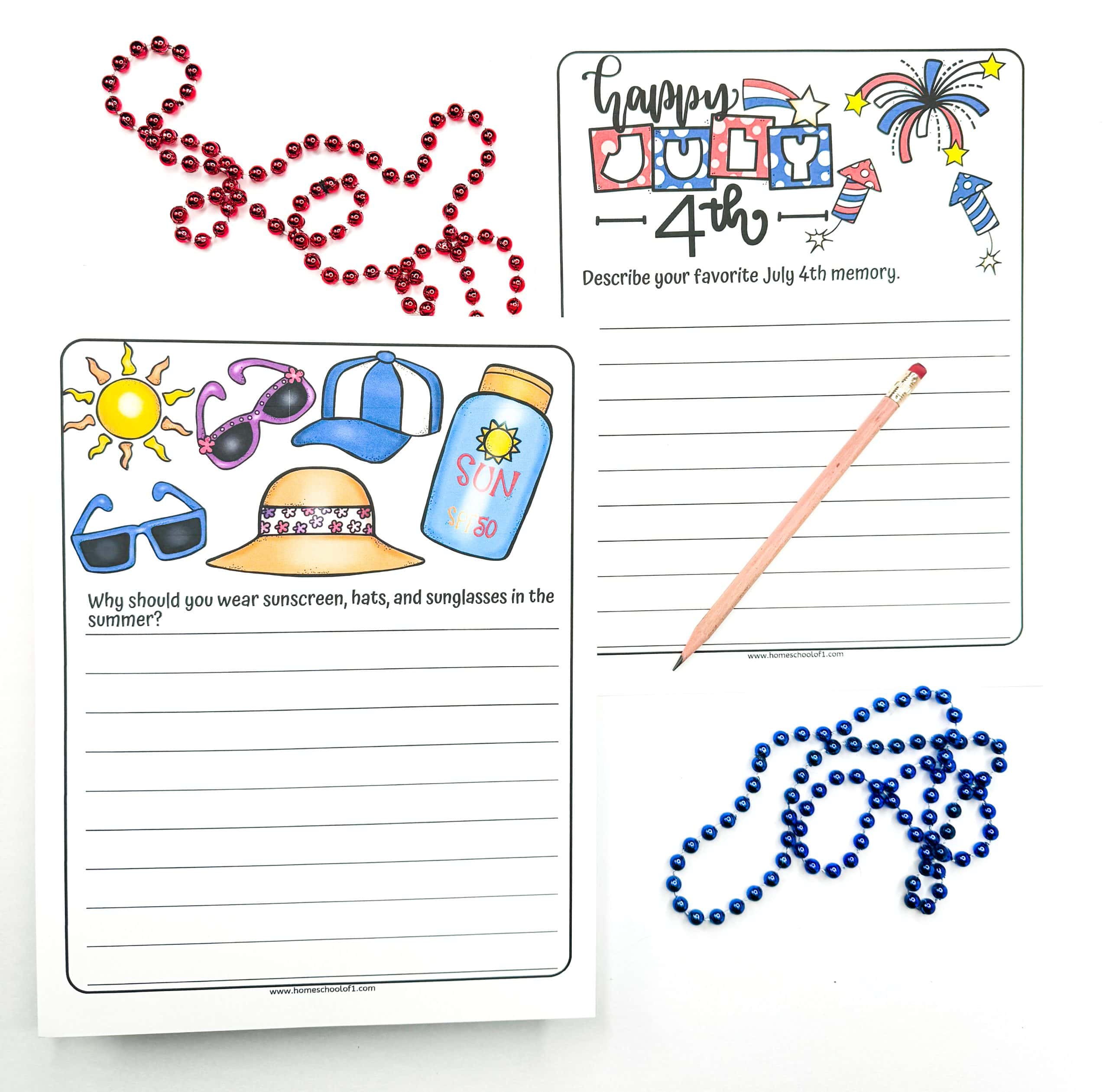 Two patriotic-themed summer writing worksheets for kids, one asking about sun safety with images of sunglasses, hats, and sunscreen, and the other prompting a July 4th memory with fireworks and festive lettering. Includes red and blue bead necklaces and a pencil.