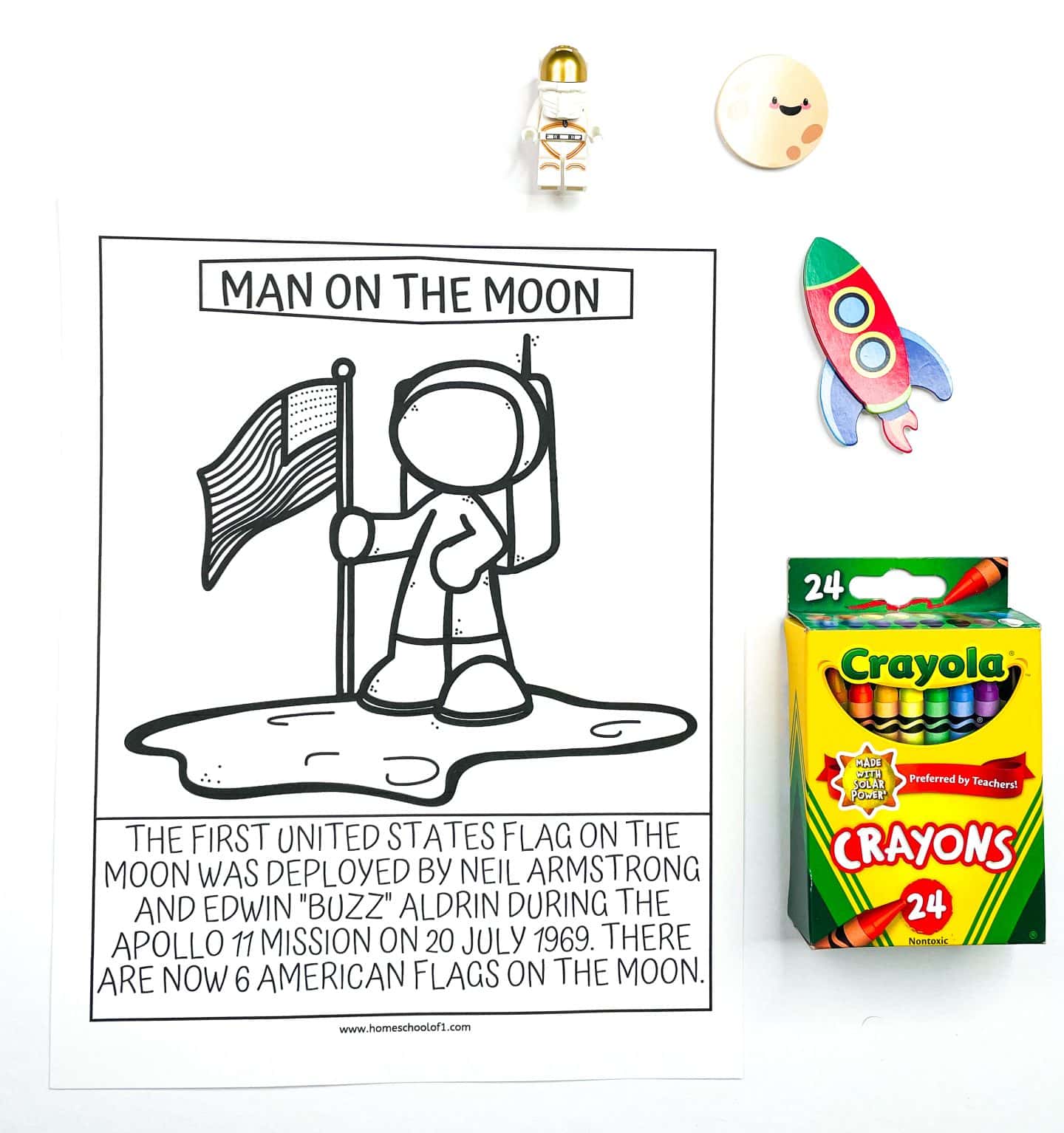 man on the moon coloring page with an astronaut holding and american flag on the moon.