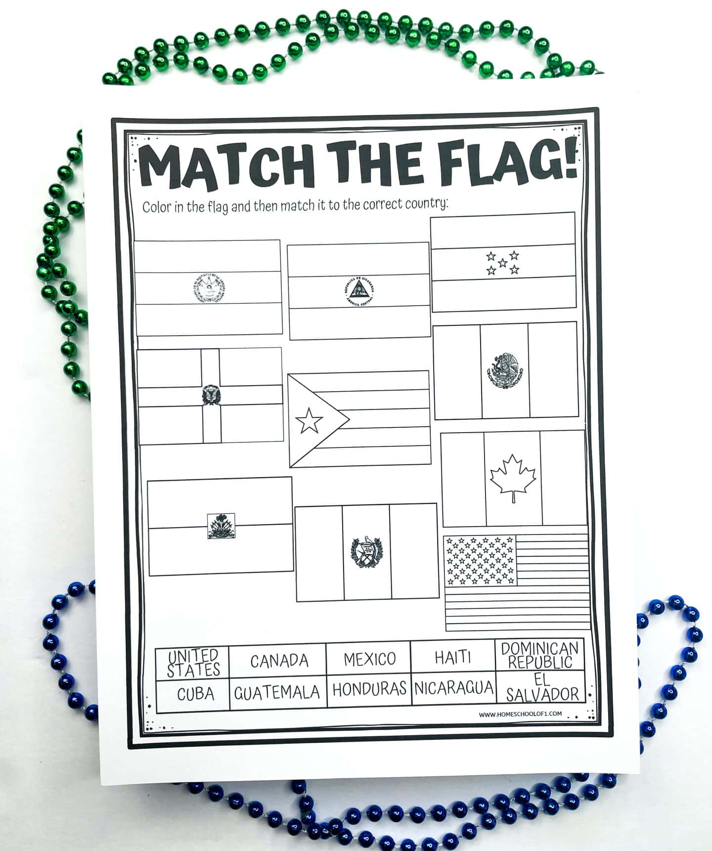 Black and white printable worksheet titled "Match the Flag!" featuring various country flags from North America. Students are instructed to color the flags and match them to the correct country from a list including the United States, Canada, Mexico, Haiti, Cuba, Guatemala, Honduras, Nicaragua, Dominican Republic, and El Salvador. The worksheet is bordered by green and blue bead necklaces.