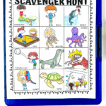 Printable “Aquarium Scavenger Hunt” sheet featuring 12 cartoon items to spot, including feeding fish, dolphin, jellyfish, scuba diving, and a turtle. Displayed on a clipboard with colorful title text at the bottom.