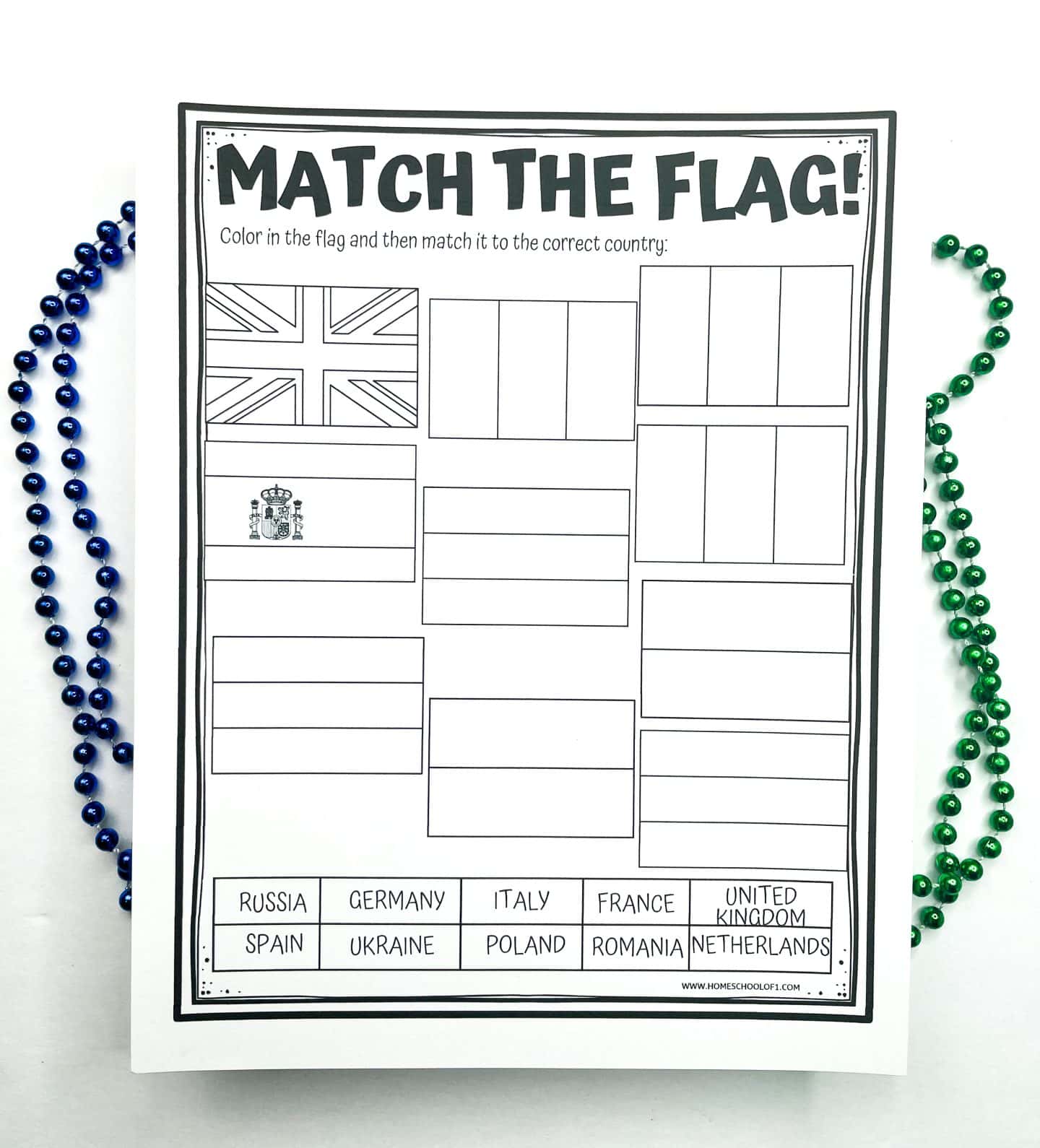Black and white “Match the Flag!” printable for kids, featuring outlines of various European country flags. Students are instructed to color in the flags and match them with the correct countries listed at the bottom, including Russia, Germany, Italy, France, United Kingdom, Spain, and more. Decorative blue and green bead strands surround the worksheet.