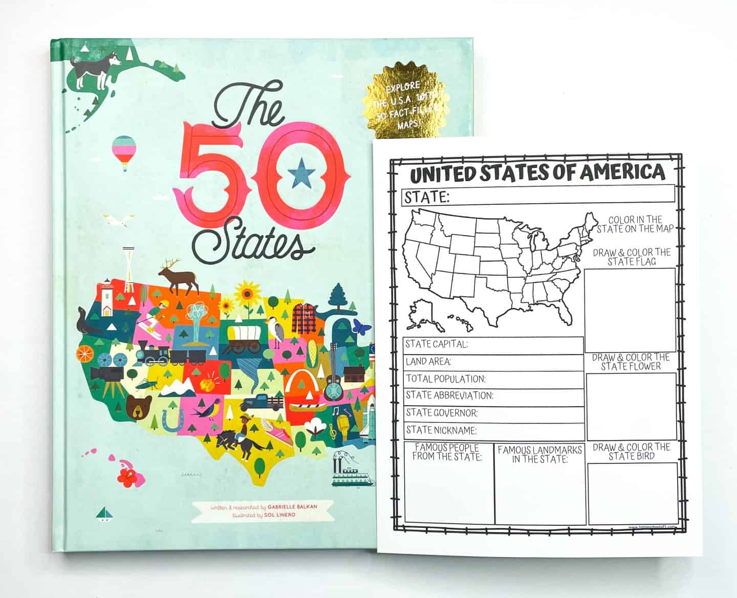 A flat-lay photo showing a colorful children’s book titled The 50 States next to a printable U.S. state facts worksheet. The worksheet features a U.S. map for students to color in a specific state and boxes to fill in details like capital, land area, population, abbreviation, governor, nickname, famous people, landmarks, and spaces to draw the state flag, flower, and bird. The book cover includes vibrant illustrations representing different U.S. regions and a gold sticker that says “Explore the U.S.A. with 50 fact-filled maps!”

