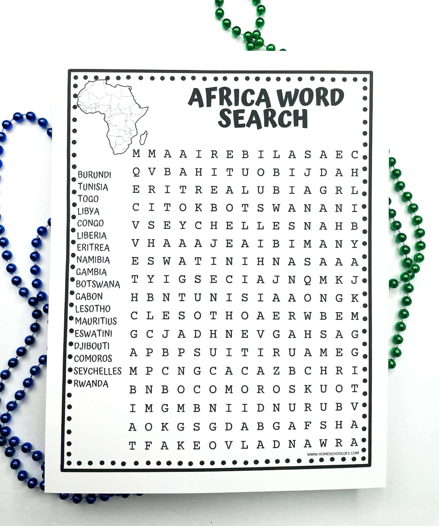 Black and white Africa word search worksheet featuring a grid filled with letters and a list of 24 African countries on the left side, including Burundi, Tunisia, Eritrea, and Seychelles. Decorative green and blue bead strings are placed around the worksheet on a white background.