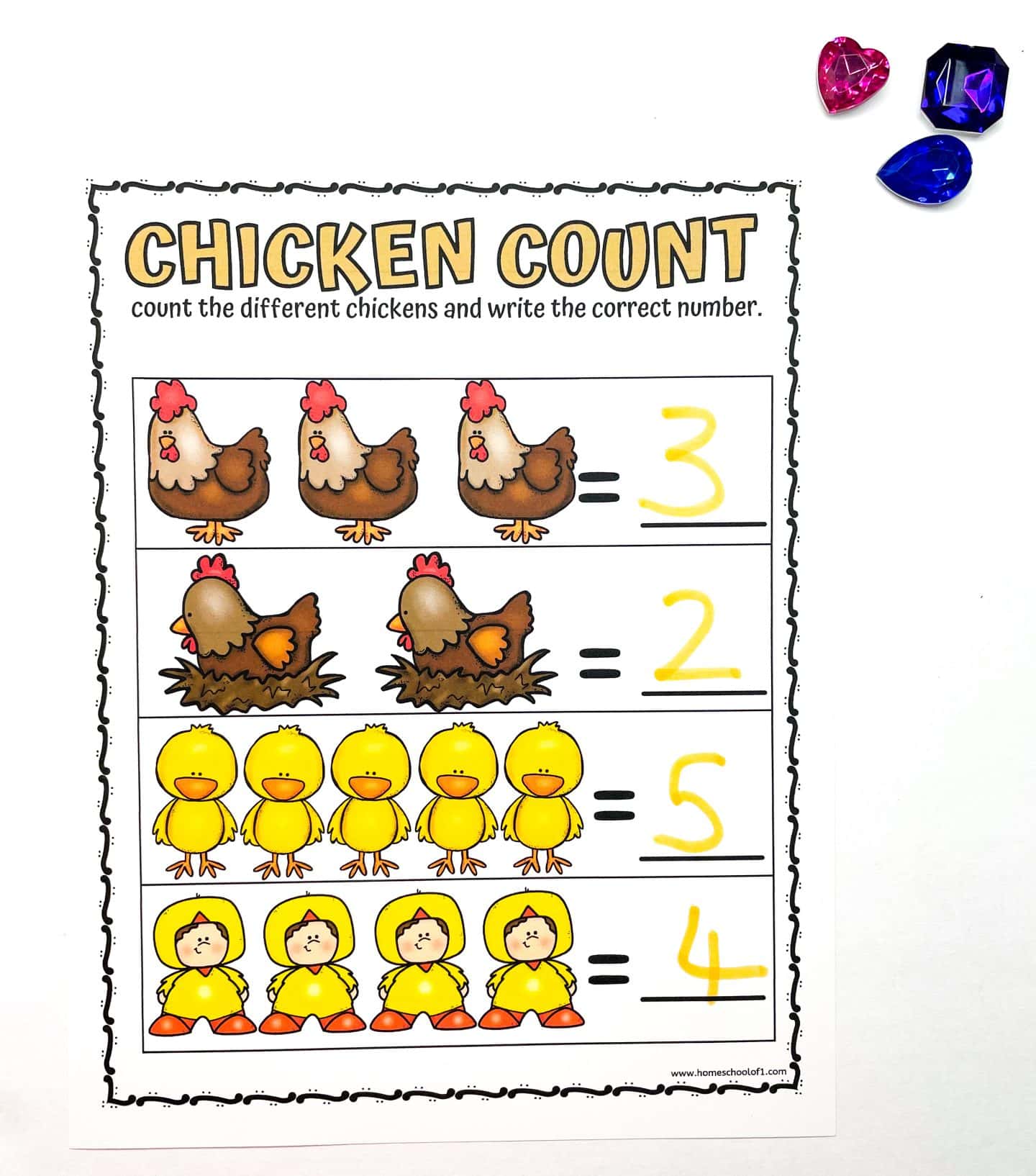A worksheet titled Chicken Count featuring cartoon chickens and chicks. Rows depict different numbers of chickens or chicks, with spaces to fill in the correct count. Colored jewels are placed on the top right corner. Numbers 3, 2, 5, and 4 are filled in.
