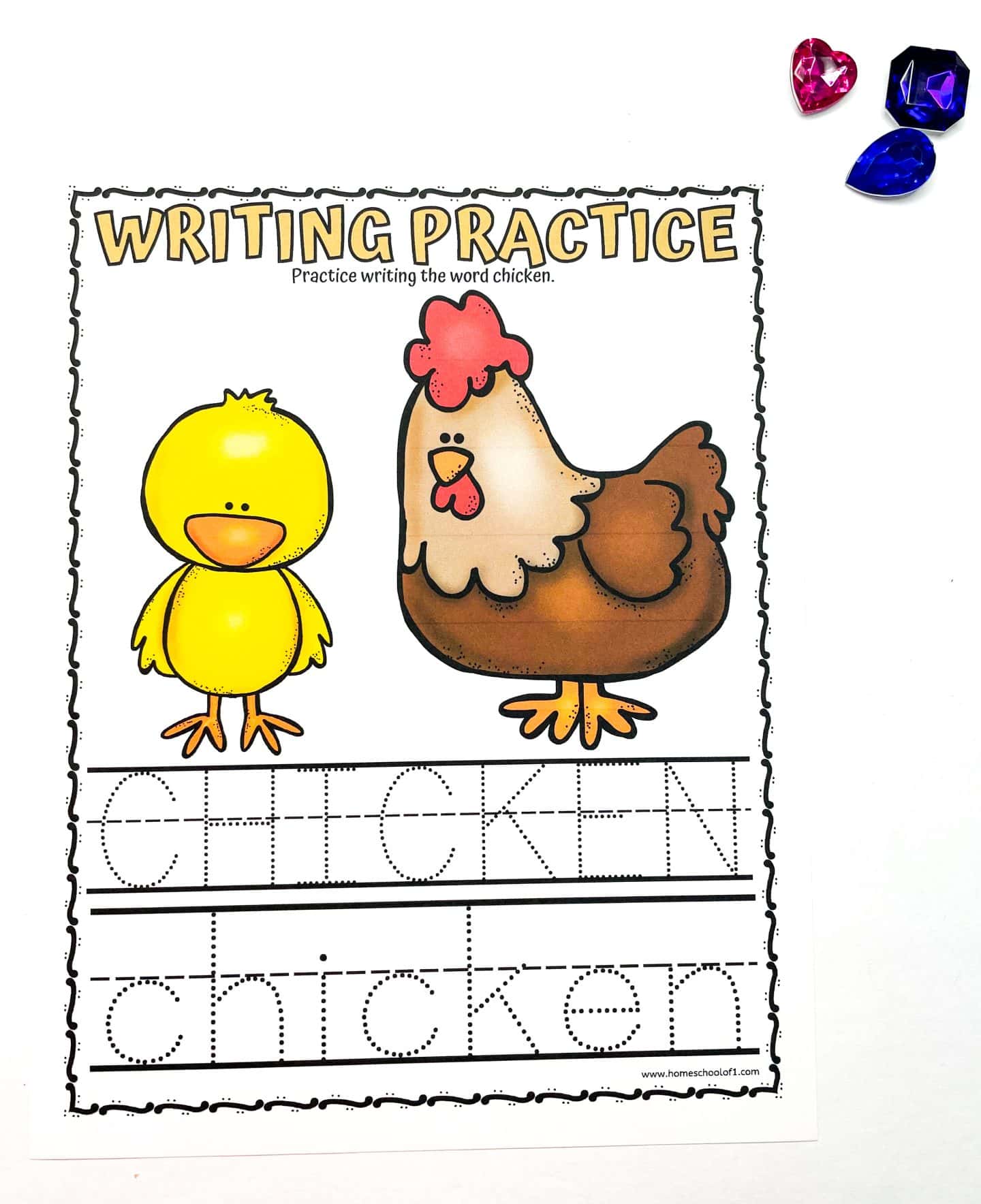 A worksheet titled Writing Practice features an illustration of a yellow chick and a brown hen. Below the images, the word CHICKEN is presented in dotted lines for tracing, with two colorful heart-shaped gems beside the sheet.

