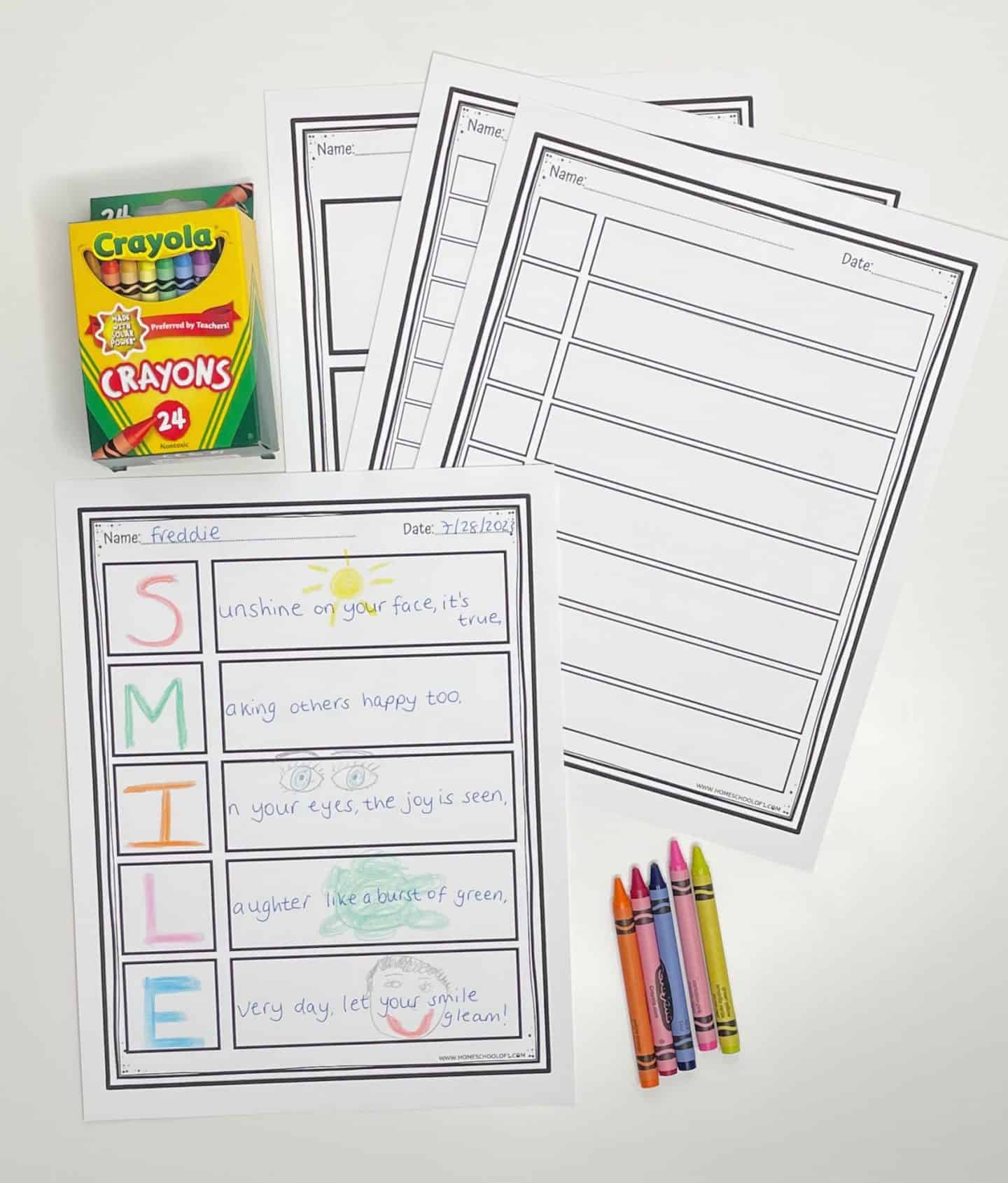 Flat lay of acrostic poem activity sheets for kids, including a completed example spelling “SMILE” with illustrated lines like “Sunshine on your face, it’s true.” The name “Freddie” and the date “7/25/2021” are written at the top. Several blank templates are stacked beside it, along with a 24-pack of Crayola crayons and four individual crayons in pink, orange, purple, and yellow for decorating.
