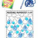 Raindrop missing number worksheet for kindergarten featuring blue water droplets and crayons.