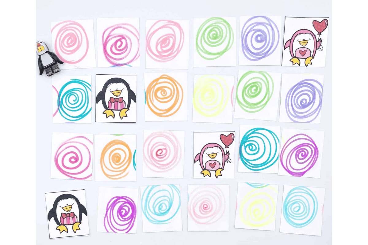 **Alt text:** Printable penguin memory game for kids showing colorful swirl-backed cards and cute penguin illustrations, a fun matching activity that helps build focus and memory skills.