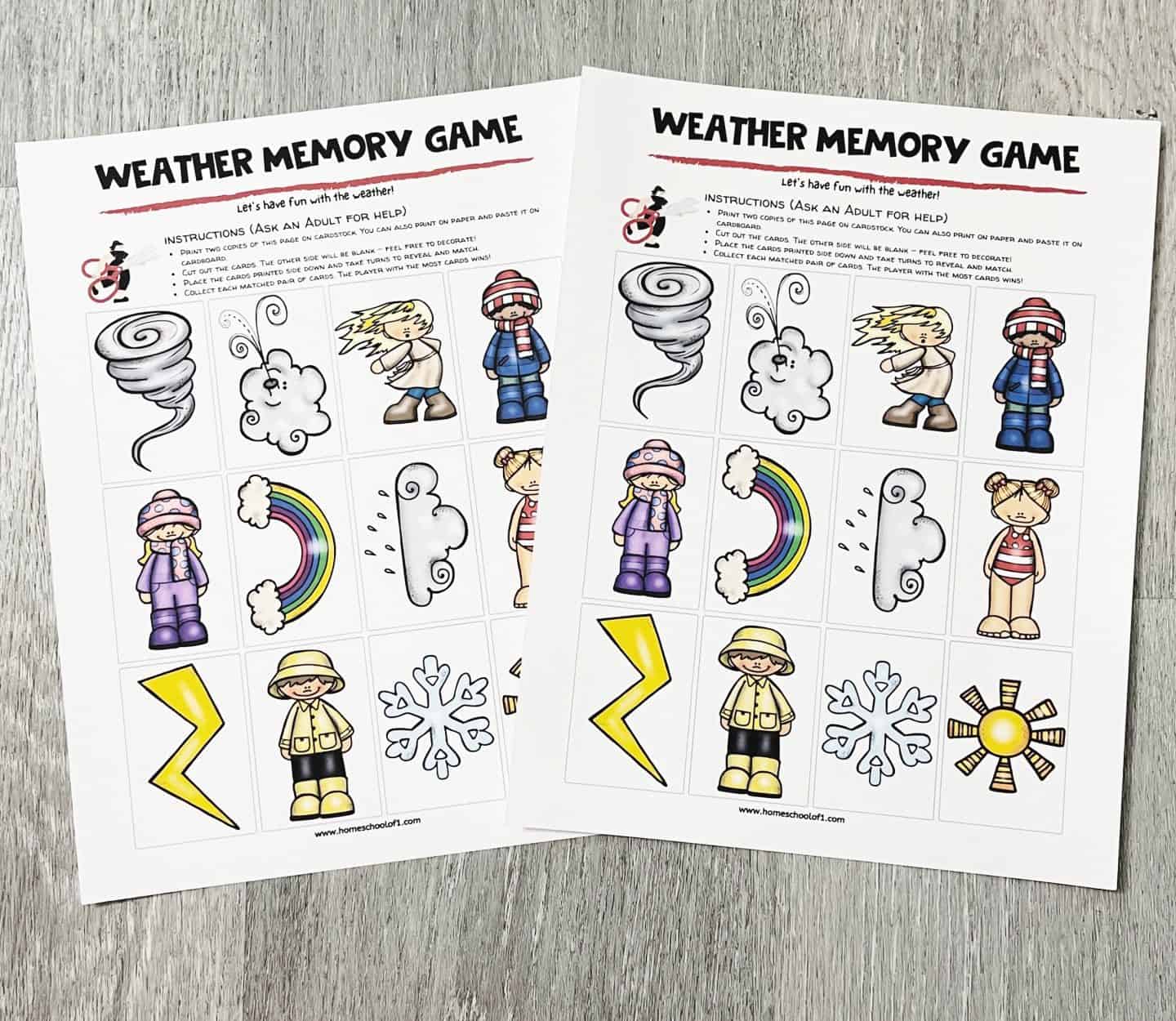 Two printable “Weather Memory Game” sheets laid out on a wooden surface, each featuring colorful weather-themed illustrations such as a tornado, lightning bolt, rainbow, sun, snowflake, and various characters dressed for different weather. Instructions for playing the memory matching game are printed at the top of each page.