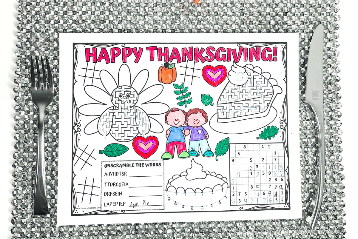 Free Thanksgiving placemat printable with coloring sections, mazes, word scramble, dot-to-dot, and sudoku to keep kids entertained at the holiday table.