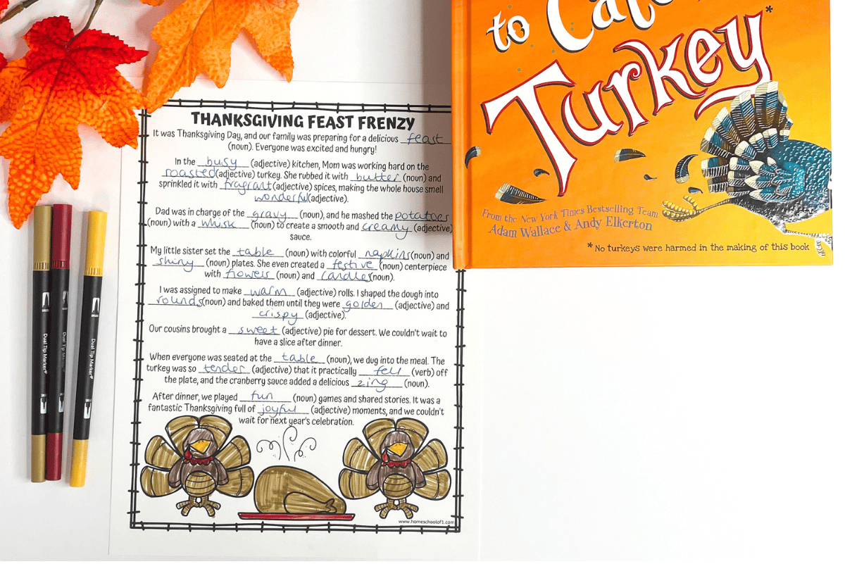 Thanksgiving Mad Libs printable worksheet titled “Thanksgiving Feast Frenzy,” filled in and colored, shown next to the book How to Catch a Turkey and fall-themed decorations.
