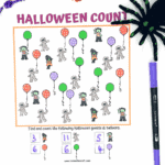 Halloween counting worksheet with spooky characters and balloons, completed by a child using purple marker.