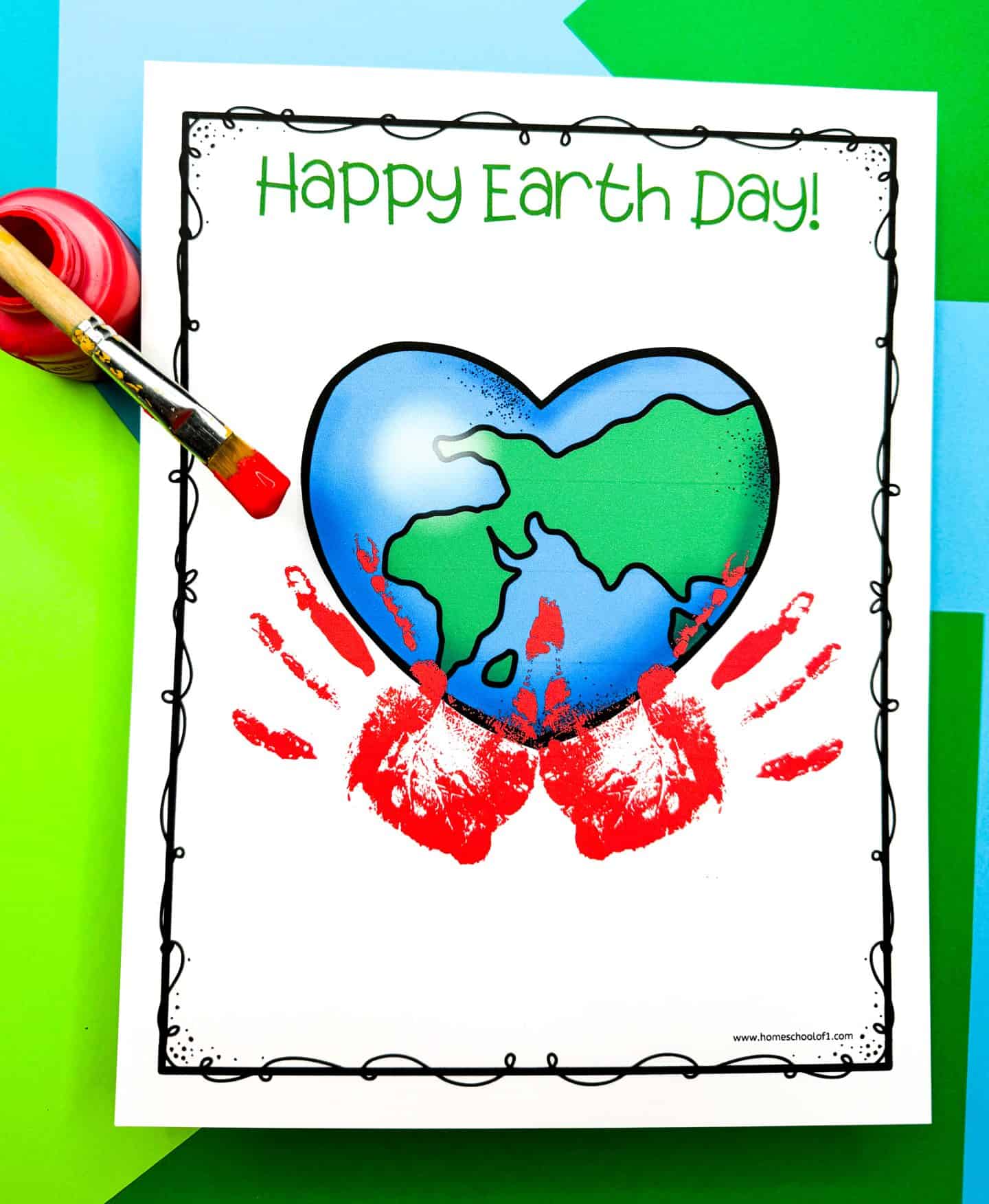 Earth Day handprint art featuring a heart-shaped Earth illustration with green continents and blue oceans, topped with the text “Happy Earth Day!” in green. Two bold red handprints are stamped below the Earth, resembling hands holding the planet. The page is surrounded by a playful black border and placed on a vibrant green and blue background with a red paint jar and brush nearby.

