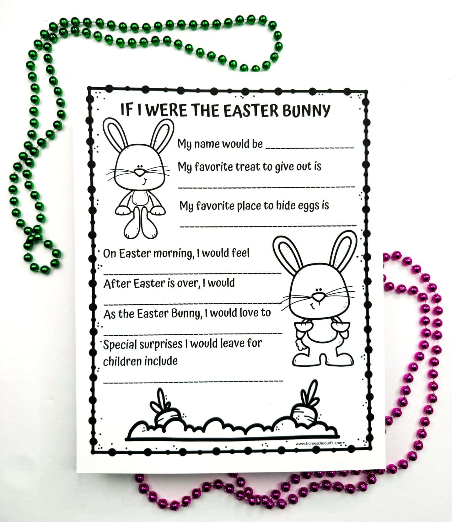 Black and white printable Easter writing prompt titled “If I Were the Easter Bunny,” designed for kids to fill in imaginative responses about the Easter Bunny’s name, favorite treat, egg hiding spots, and more. The sheet is decorated with cute bunny illustrations and carrots in the ground, and it’s surrounded by green and pink beaded necklaces for a festive touch. 