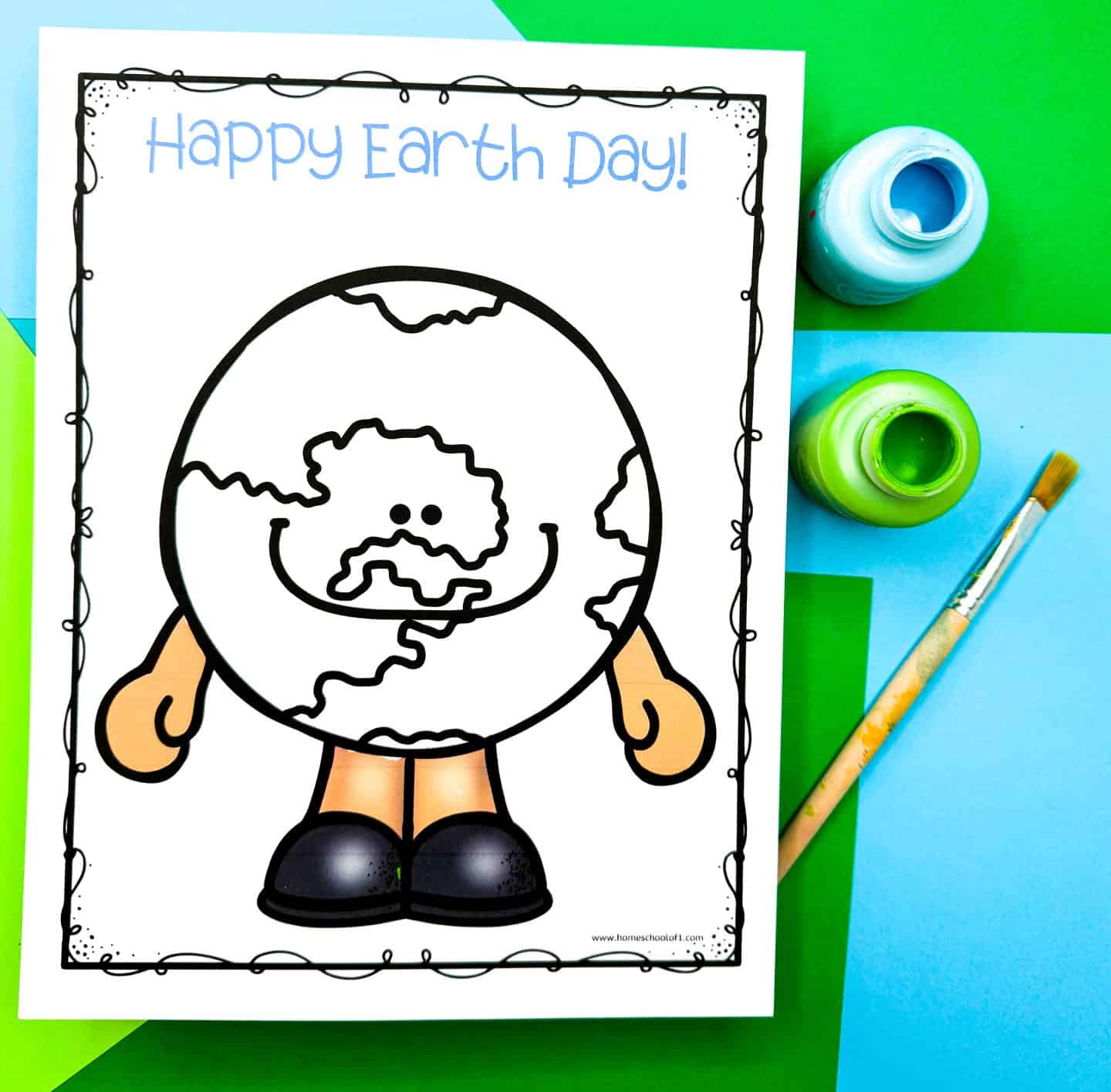 Earth Day craft template featuring a smiling cartoon globe character with arms, legs, and shoes, under the text “Happy Earth Day!” in light blue. The globe is uncolored, ready for paint or handprint art, and is placed on a colorful green and blue background with open paint pots and a paintbrush beside it.

