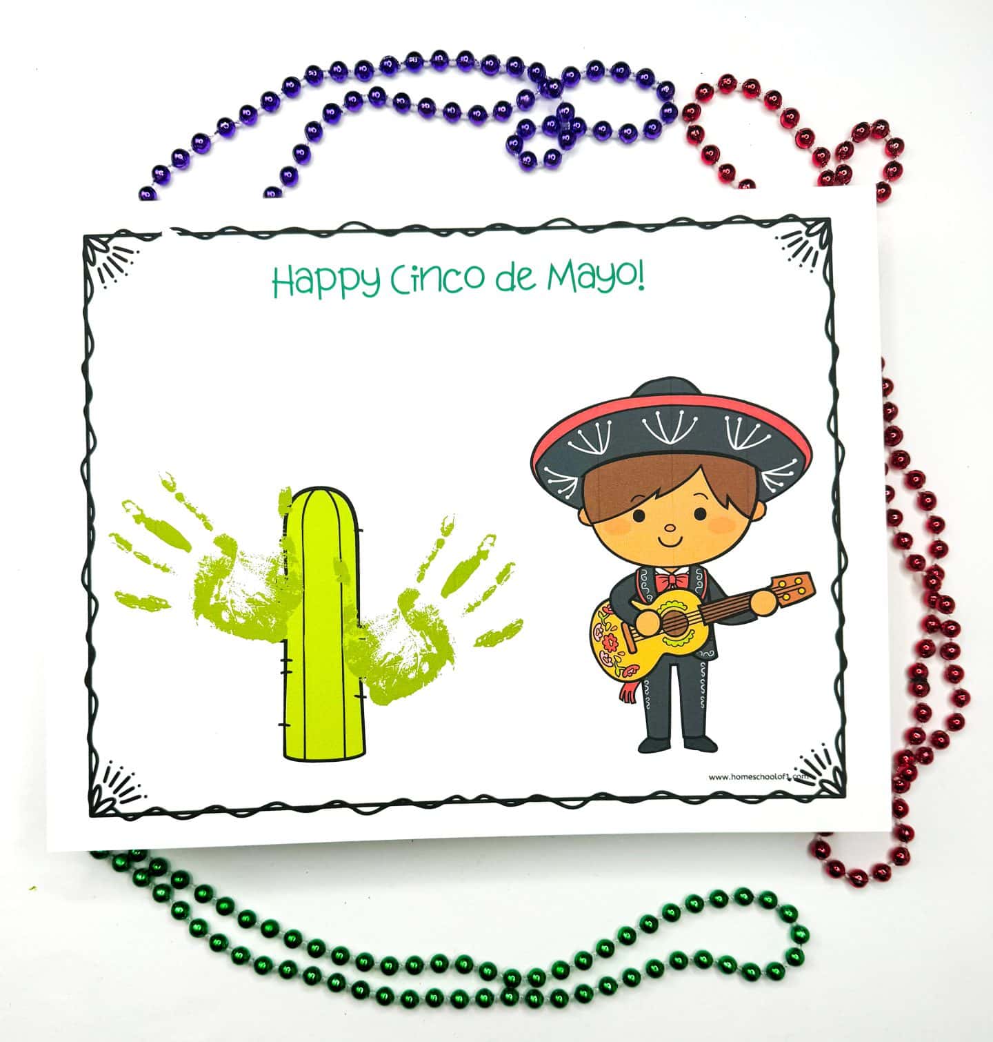 A cheerful handprint art creation featuring the text "Happy Cinco de Mayo!" surrounded by festive decorations, embodying the celebratory essence of the holiday.
